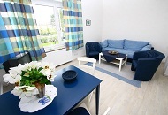 Kleine Ferienwohnung in Haffkrug bei Scharbeutz; direkte Strandlage mit Meerblick. Foto des Wohnzimmers